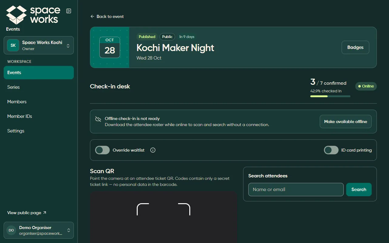 Check-in desk with scanner and progress, dark theme